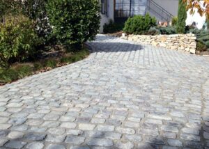 Reclaimed grey and beige Versailles sandstone cobblestones