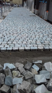 Laying of reclaimed cobbles at the Hotel Dieu in Lyon