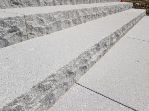 Bush hammered granite steps